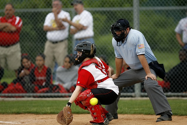 softball umpire and catcher